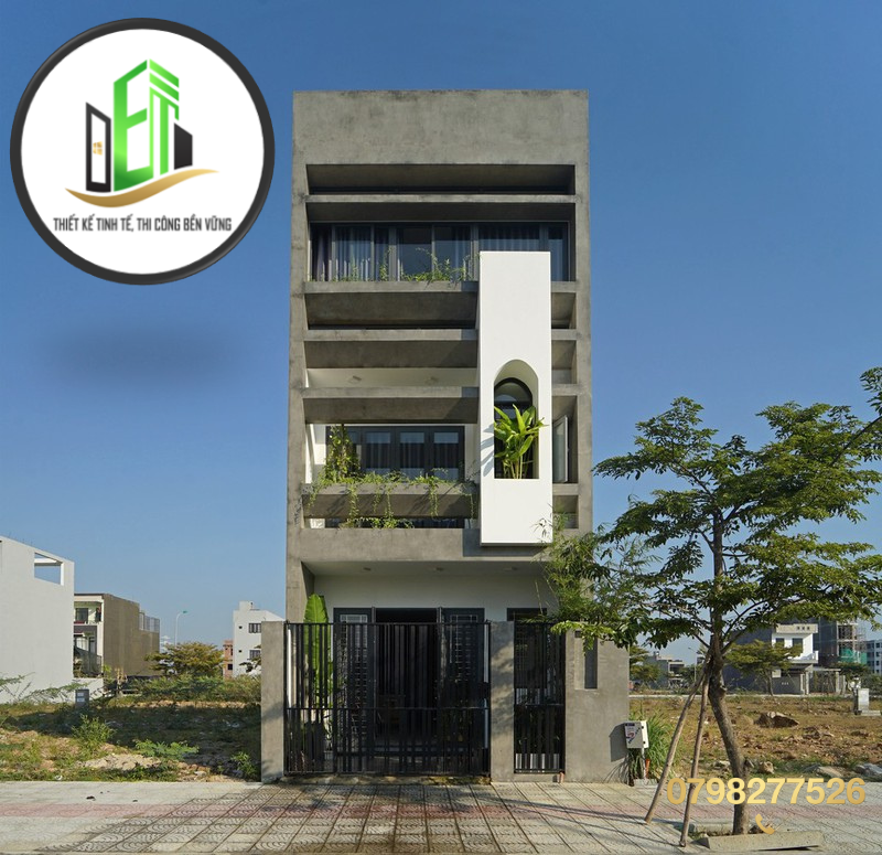 Mẫu thiết kế nhà phố mái bằng hiện đại ứng dụng giải pháp chống nóng toàn diện cho mặt tiền hướng Tây.